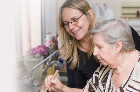 Notaro Care Homes Support Worker cooking with service user