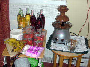 Non alcoholic sparkling drinks and chocolate fountain set out in the lounge