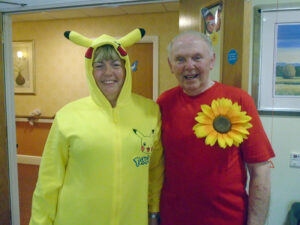 Winners of best dresses; Sue dressed as pikachu and Sam wearing a red t shirt with giant sunflower