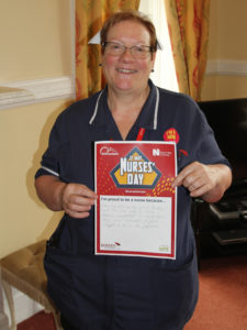 Clarence Park nurse holding her 'what makes her proud to be a nurse' statement