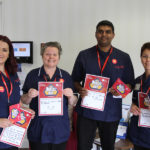 La Fontana Nurses holding their 'what makes them proud to be a nurse' statements