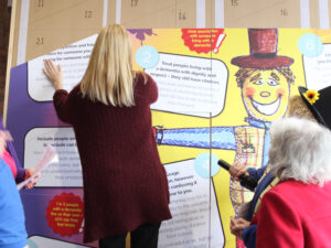 Immacolata House's Activities Assistant placing their sponsored Jigsaw piece