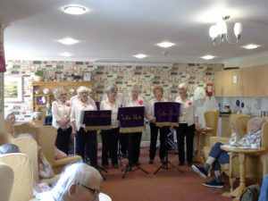 Singing to residents, relatives and staff at Immacolata house