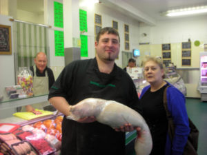 Manager Teresa picking up the pig from Darrell's Butchers