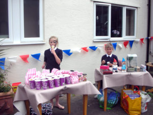 School pupils managing the sweet and nik naks stalls