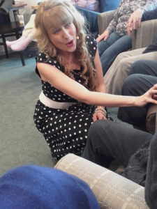 Amanda singing to residents during her concert at Casa di Lusso