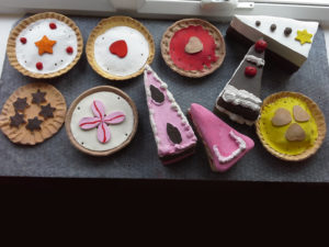 Immacolata House resident's finished painted clay cakes