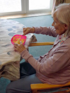 Resident mixing icing colours