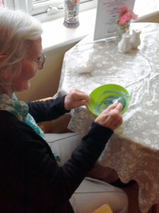Resident mixing icing colours