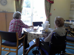 Residents making cookies for halloween