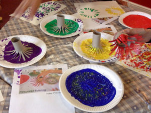 Making firework paintings with toilet cut up cardboard toilet roll tubes