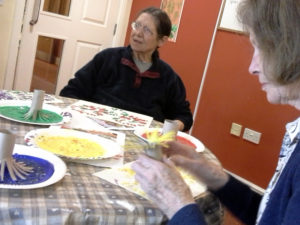 residents making firework paintings with toilet cut up cardboard toilet roll tubes