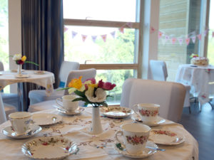 The american lounge, Casa di Lusso, dressed for afternoon tea with the Women's institute and FreeWheelers