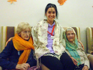 Staff and residents dressed in Indian head scarfs