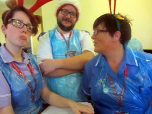 Immacolata House staff wearing festive head gear