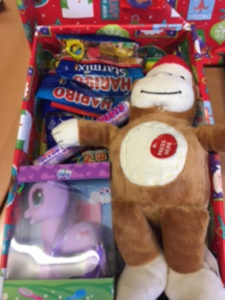 inside the packed shoe boxes from Stuart House as part of the Samaritans’ Purse ‘Operation Christmas Child’ appeal.