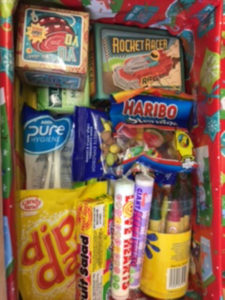inside the packed shoe boxes from Stuart House as part of the Samaritans’ Purse ‘Operation Christmas Child’ appeal.