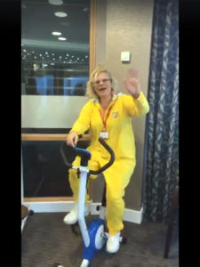 Louise, activities coordinator on the exercise bike for children in need