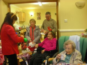 Residents and loved ones choosing musical intruments