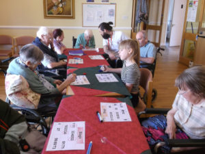 Residents and loved ones during the bingo game