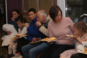 Residents and loved ones enjoying the buffet at the Limes Christmas Party