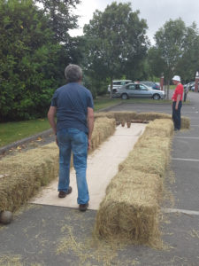 Playing skittles at the fete
