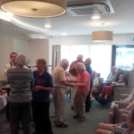 Casa di Lusso residents a staff dancing to live music on Armed Forces Day