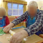 Aspen Court residents rolling out the icing for their Christmas Cake