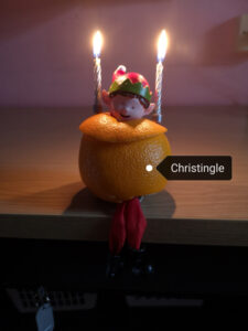 Elf taking part in the Christingle celebrations