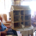Clarence Park care home residents renovating their dolls house